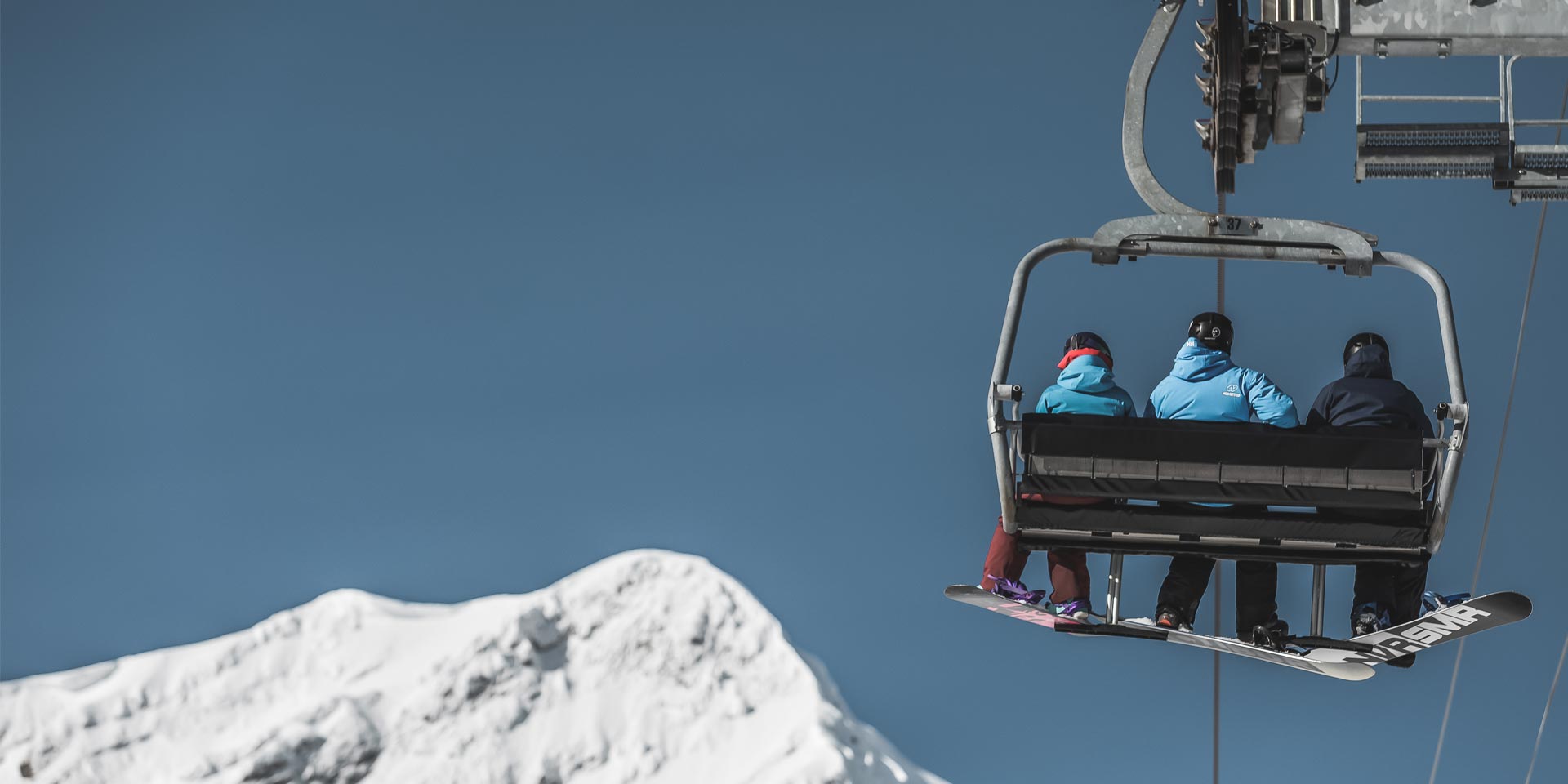 snowboarders-on-chairlift.jpg